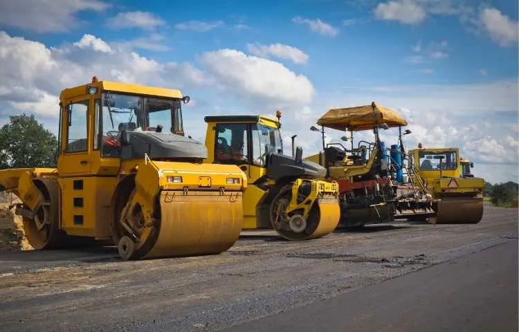 Advanced construction machinery for road construction and site grading in Gurgaon.